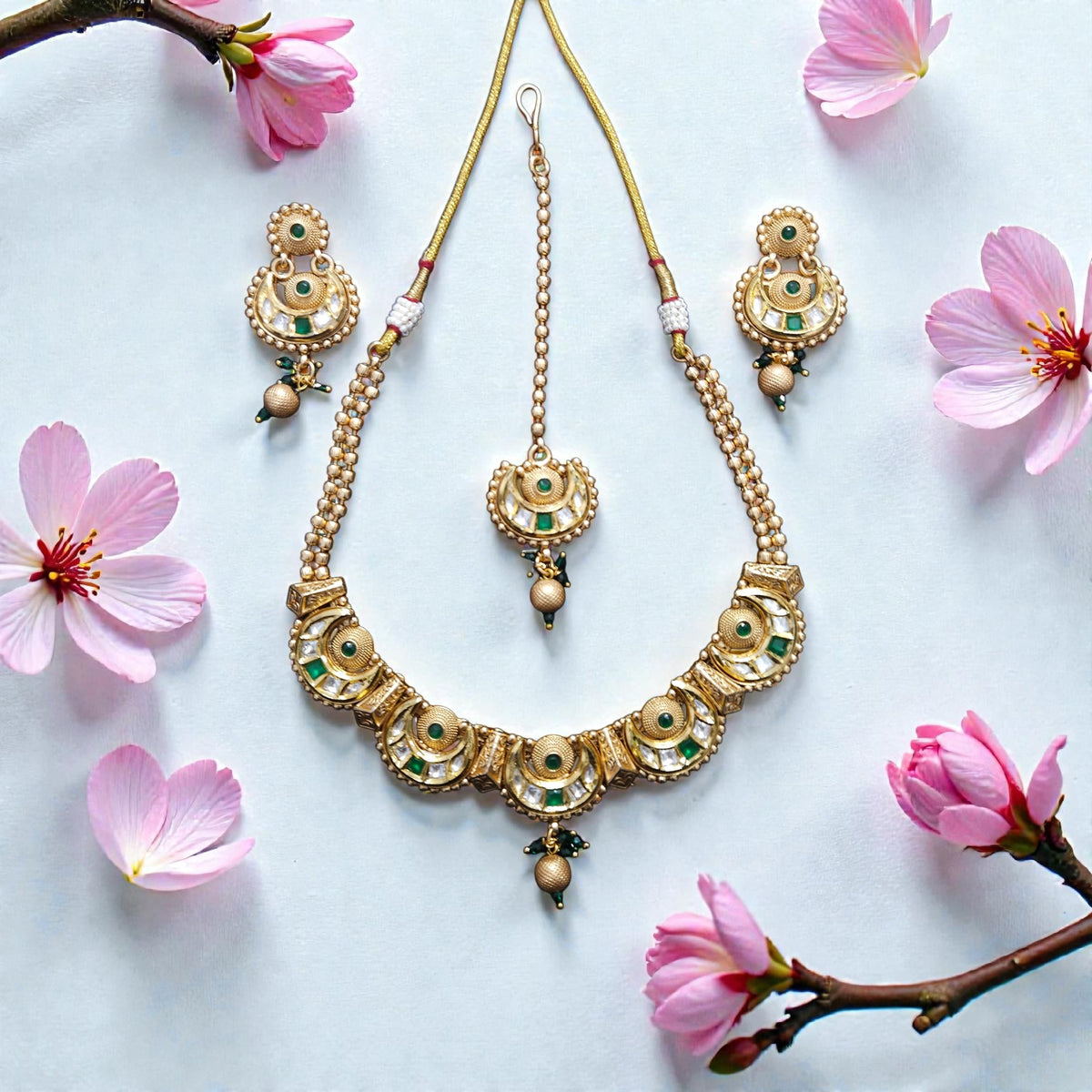 Traditional Gold Tone Crescent Motif Necklace Set with Green Stone Accents