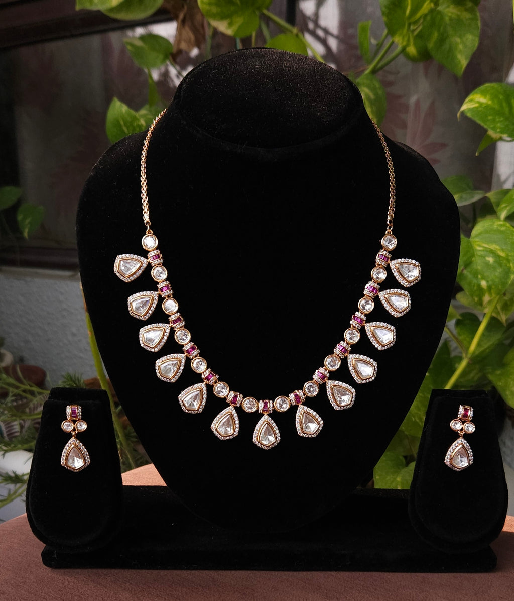 Gold Plated Kundan Look Necklace Set with Ruby Detailing & Matching Earrings