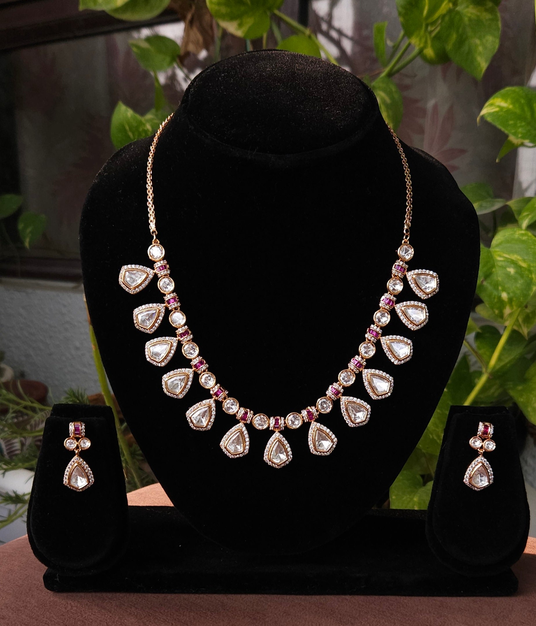 Gold Plated Kundan Look Necklace Set with Ruby Detailing & Matching Earrings