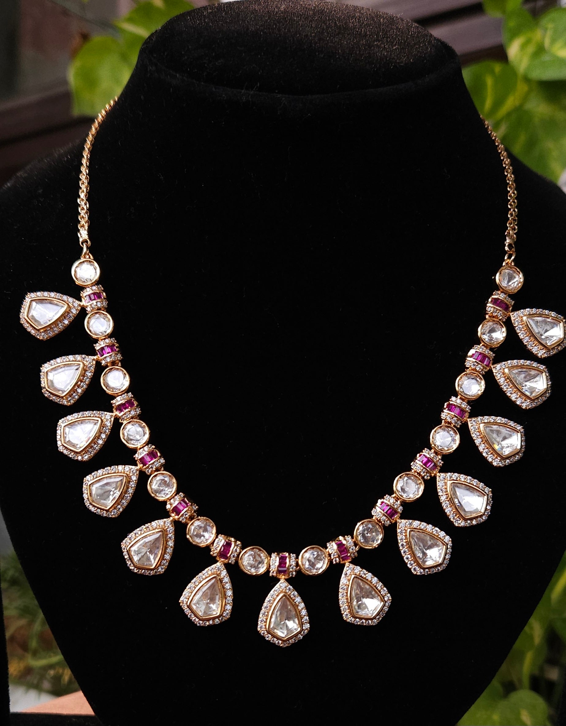 Gold Plated Kundan Look Necklace Set with Ruby Detailing & Matching Earrings