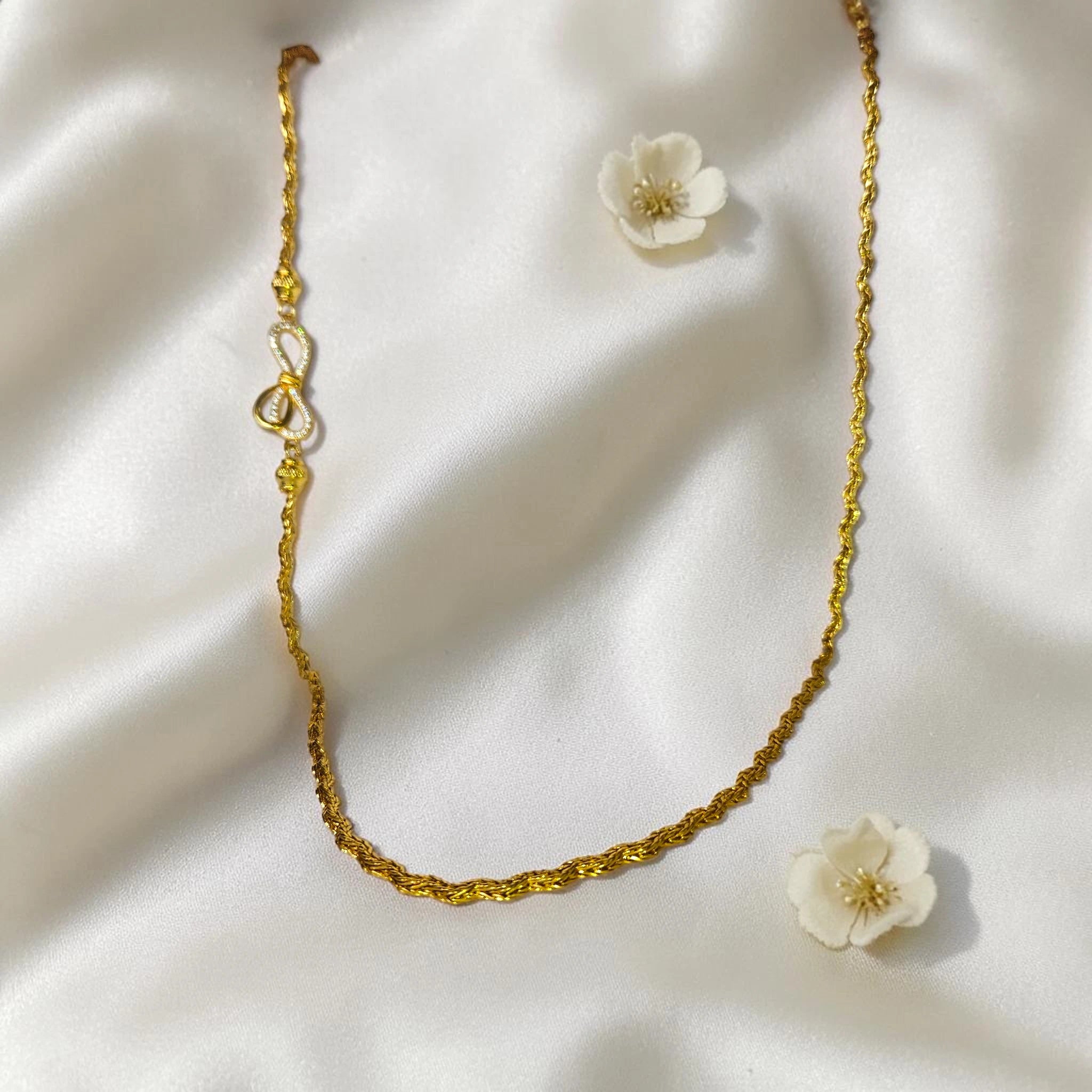 Shangri 30 Inch Gold Plated Chain Necklace with AD Stone Bow Motif