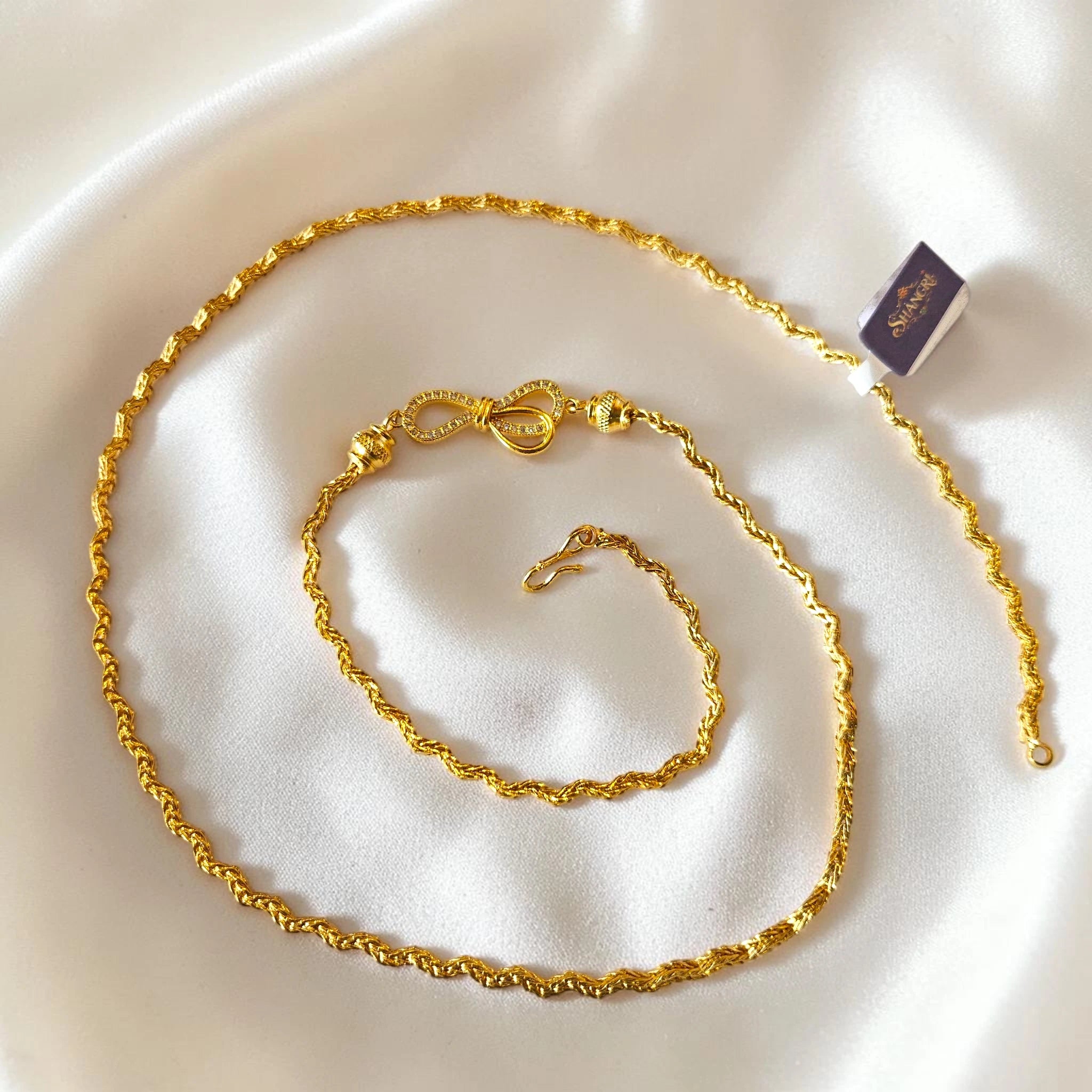 Shangri 30 Inch Gold Plated Chain Necklace with AD Stone Bow Motif