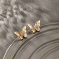 Gold-Plated Butterfly Themed AD Studded Stud Earrings
