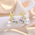 Shangri Gold Pearl Drop AD Earrings – Korean Cross Design Crystal Studs