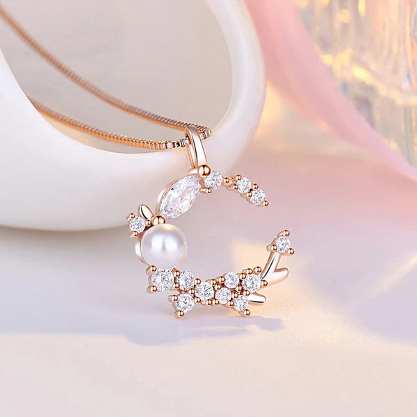 Rose Gold Plated American Diamond Studded Moon Shape Contemporary Pendant Necklace