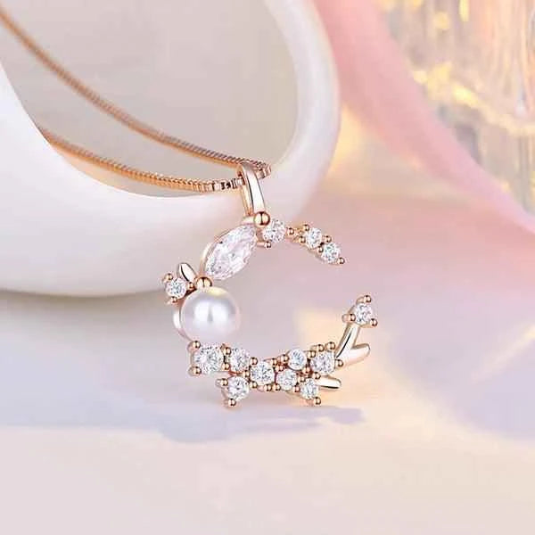Rose Gold Plated American Diamond Studded Moon Shape Contemporary Pendant Necklace