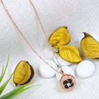 Stainless Steel Gold/Rosegold Plated Floral Spinning Pendant Necklace - Shangri 