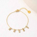 Stainless Steel Baguette Cubic Zirconia Bracelet – Gold / Rose Gold Plated