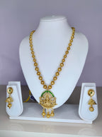 Gold Plated Lakshmi Temple Necklace Set with Green Stone Accents
