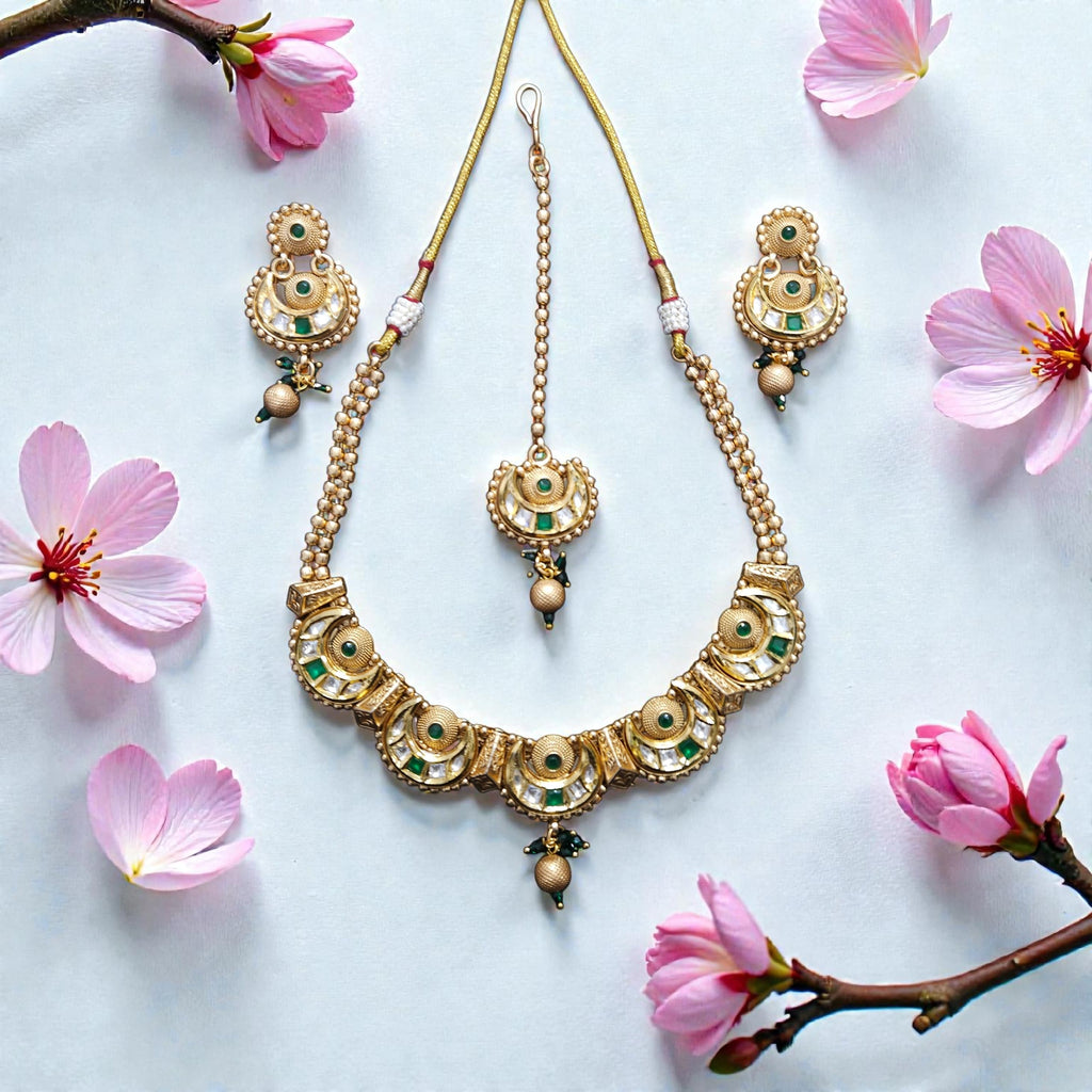 Traditional Gold Tone Crescent Motif Necklace Set with Green Stone Accents