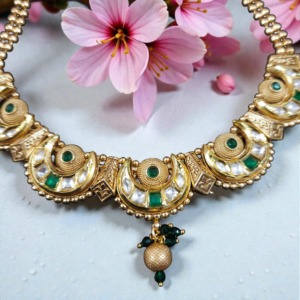 Traditional Gold Tone Crescent Motif Necklace Set with Green Stone Accents