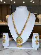 Gold Plated Lakshmi Temple Necklace Set with Green Stone Accents
