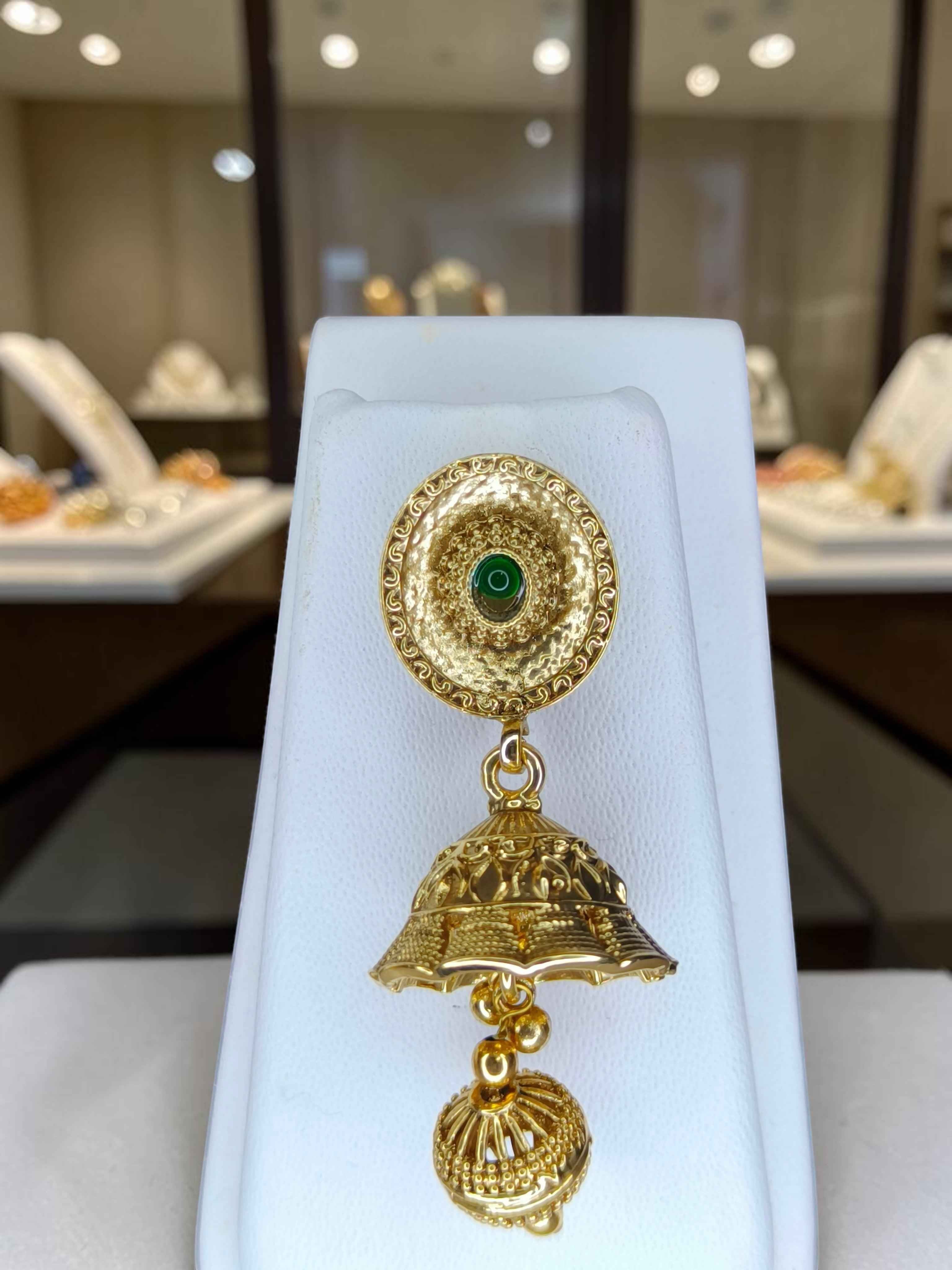 Gold Plated Lakshmi Temple Necklace Set with Green Stone Accents