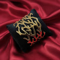 Shangri-La gold finish statement kada with abstract cut-out pattern, anti-tarnish material.