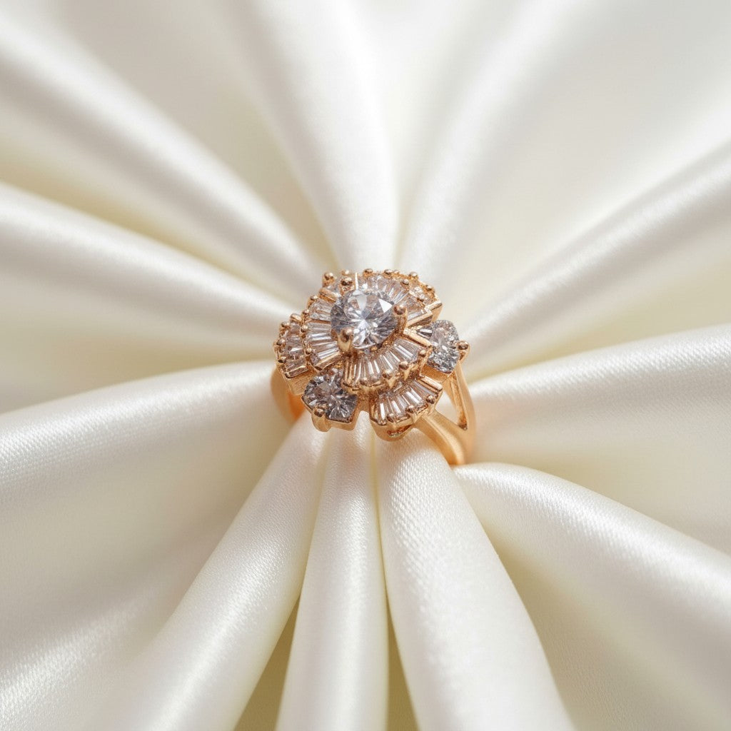 Shangri rose gold plated floral cocktail ring featuring American Diamond baguette and princess-cut stones on silk