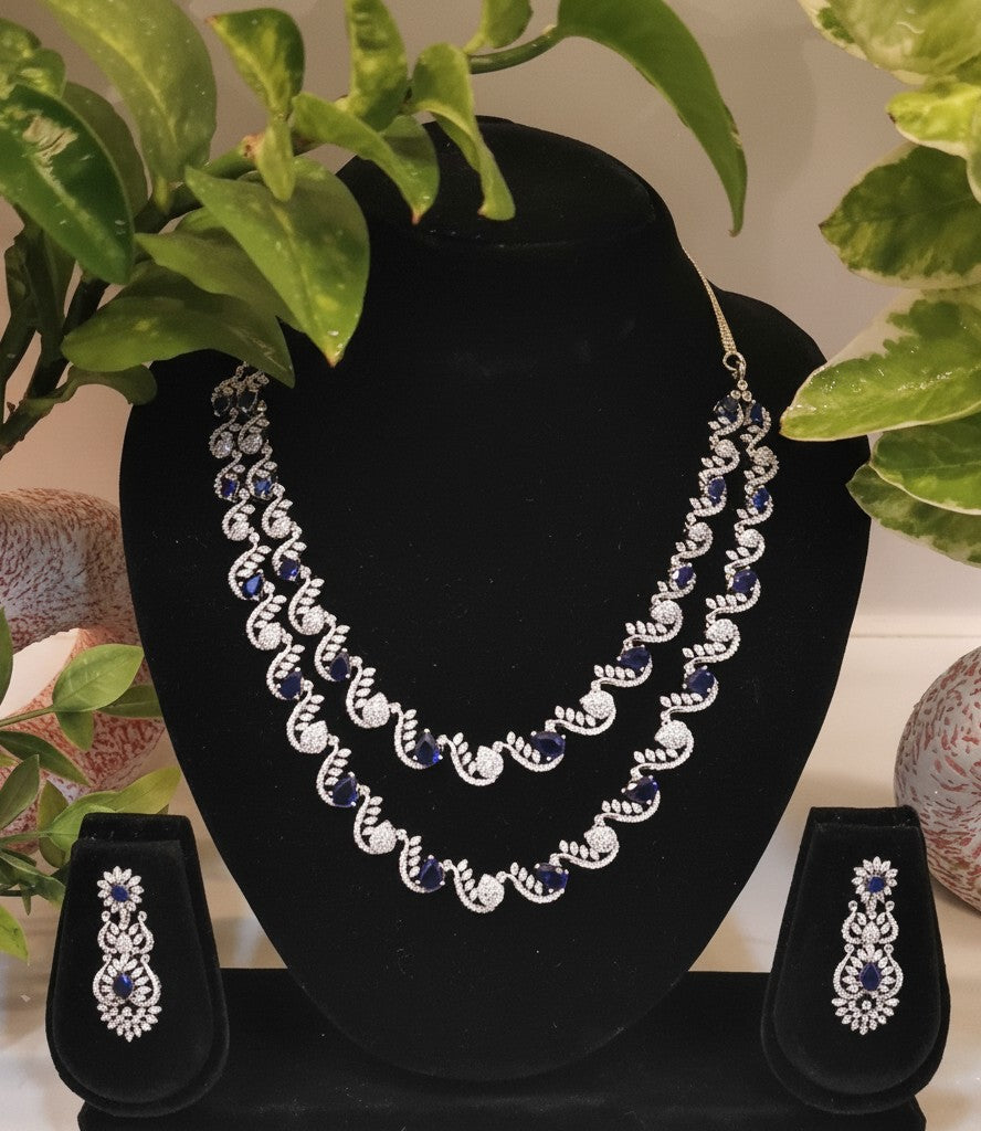 Shangri double-layer silver-plated choker necklace set with blue stones and American diamonds, including matching earrings